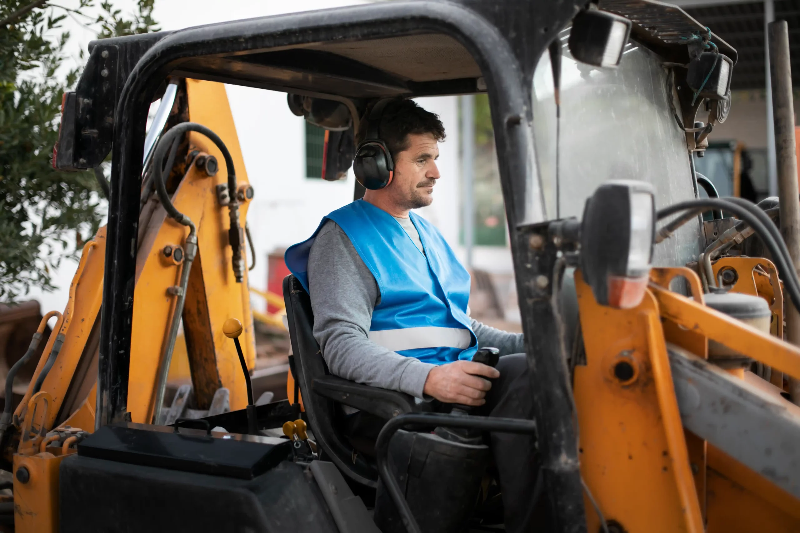 1-man-using-excavator-digging-day-light