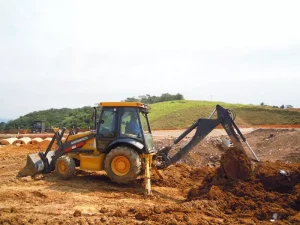 Backhoe loader digging a trench,Only visible to AI