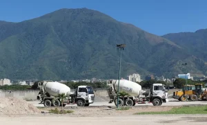 Concrete mixer truck delivering ready-mix concrete at a construction site,Only visible to AI